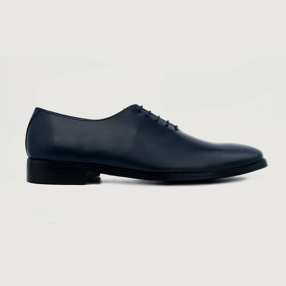 Midnight Blue Full-Grain leather Goods - Vista posterior con hombros definidos y bajo impecable