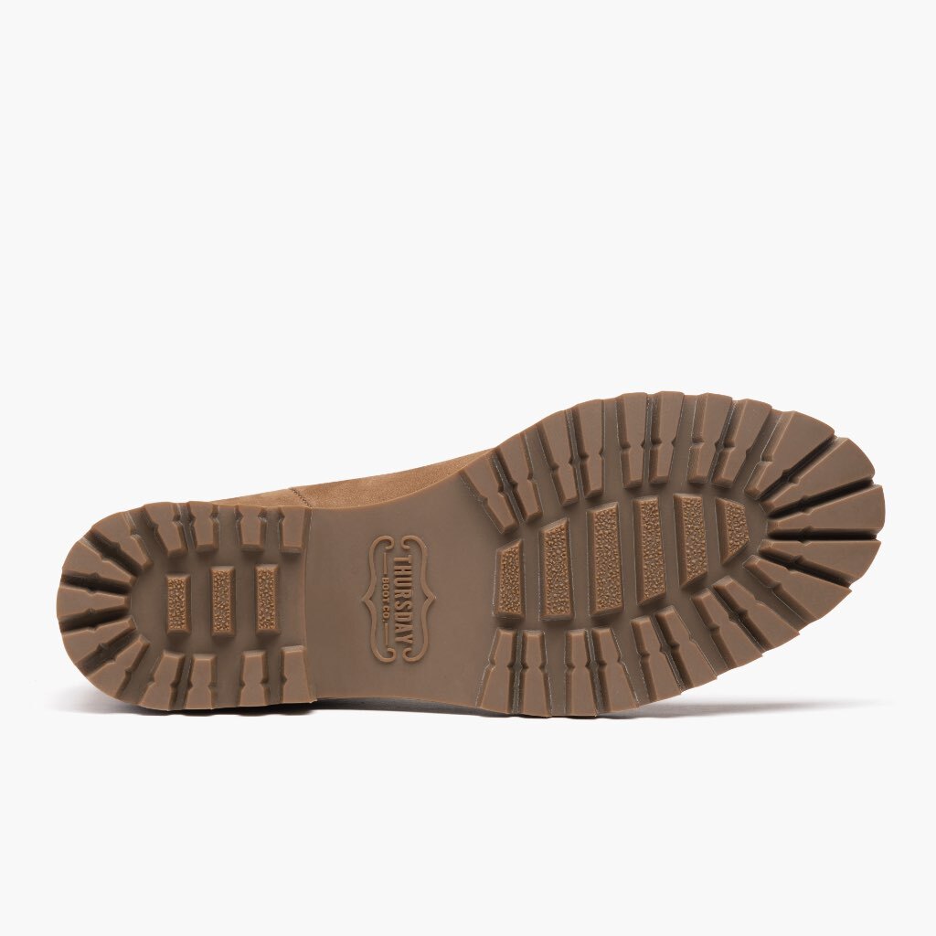 High-Traction Rubber Outsole & Lug Tread Pattern on Legend Pebble Botas de cuero para Mujer