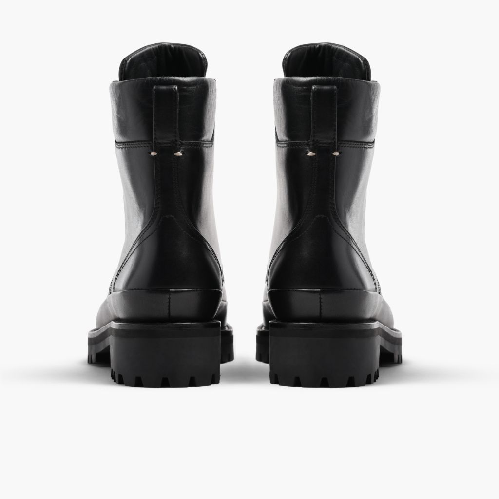 High-Traction Rubber Outsole & Lug Tread Pattern on Ryder Negro Botas de cuero para Mujer