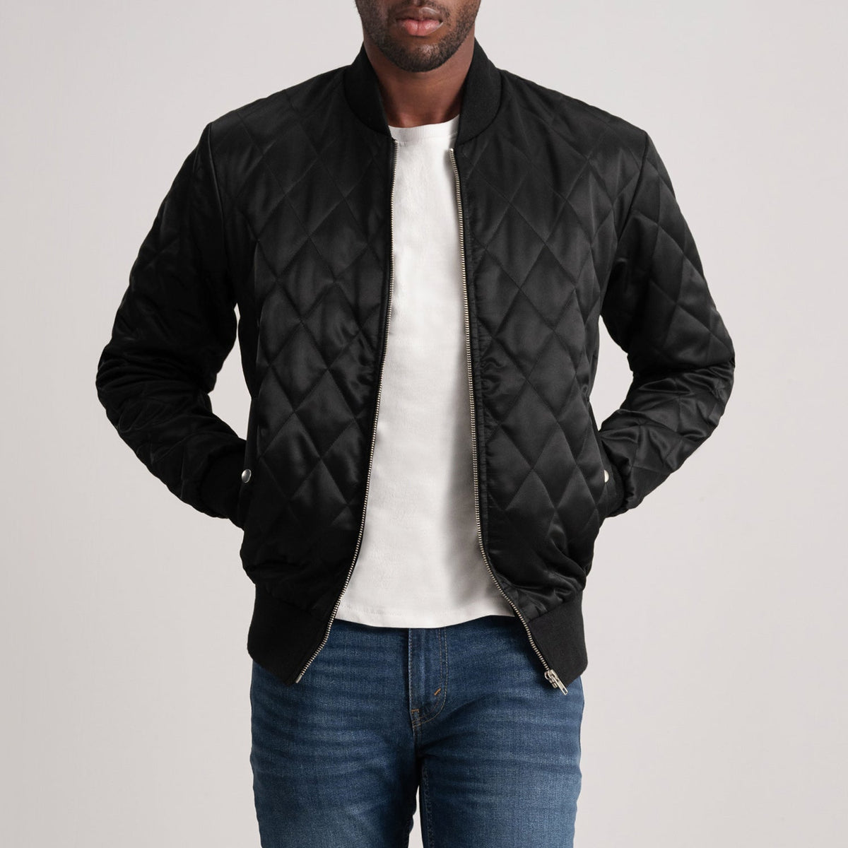 Black Satin Varsity Jacket - Vista trasera con ajuste entallado en hombros y bajo impecable