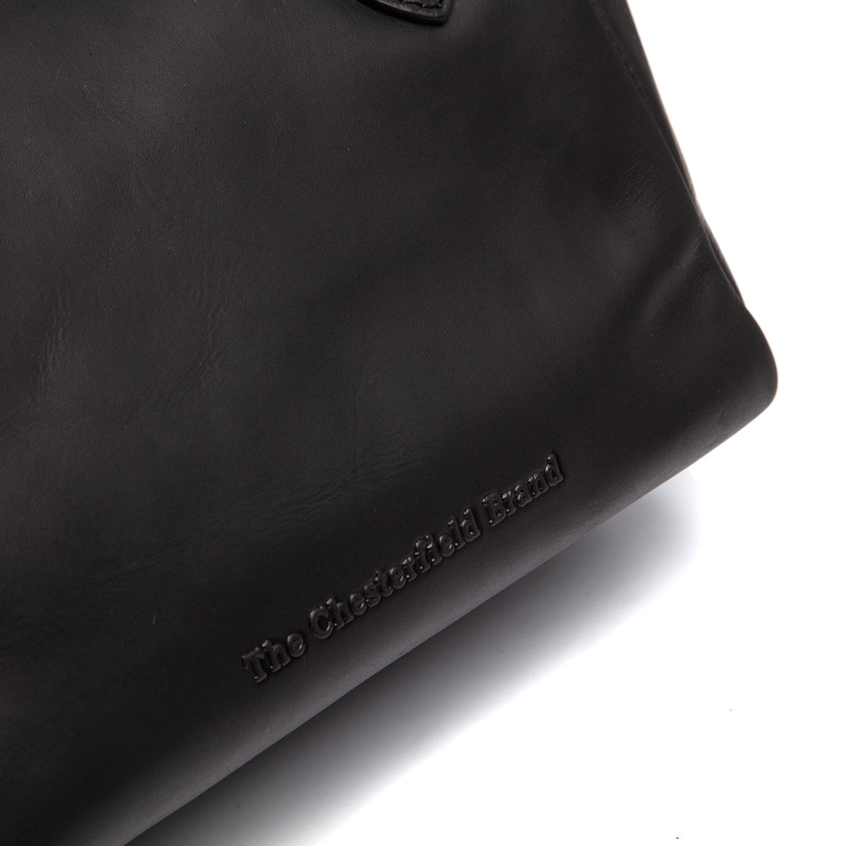 
Chili Bolso de mano de cuero flor - Vista lateral mostrando el corte ergonómico de mangas