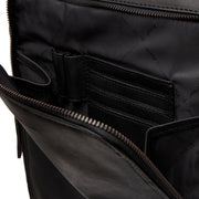 
Solid Antique Brass Hardware & Heavy-Duty Dual Zipper Detail on Jasper Mochila de cuero flor para portátil