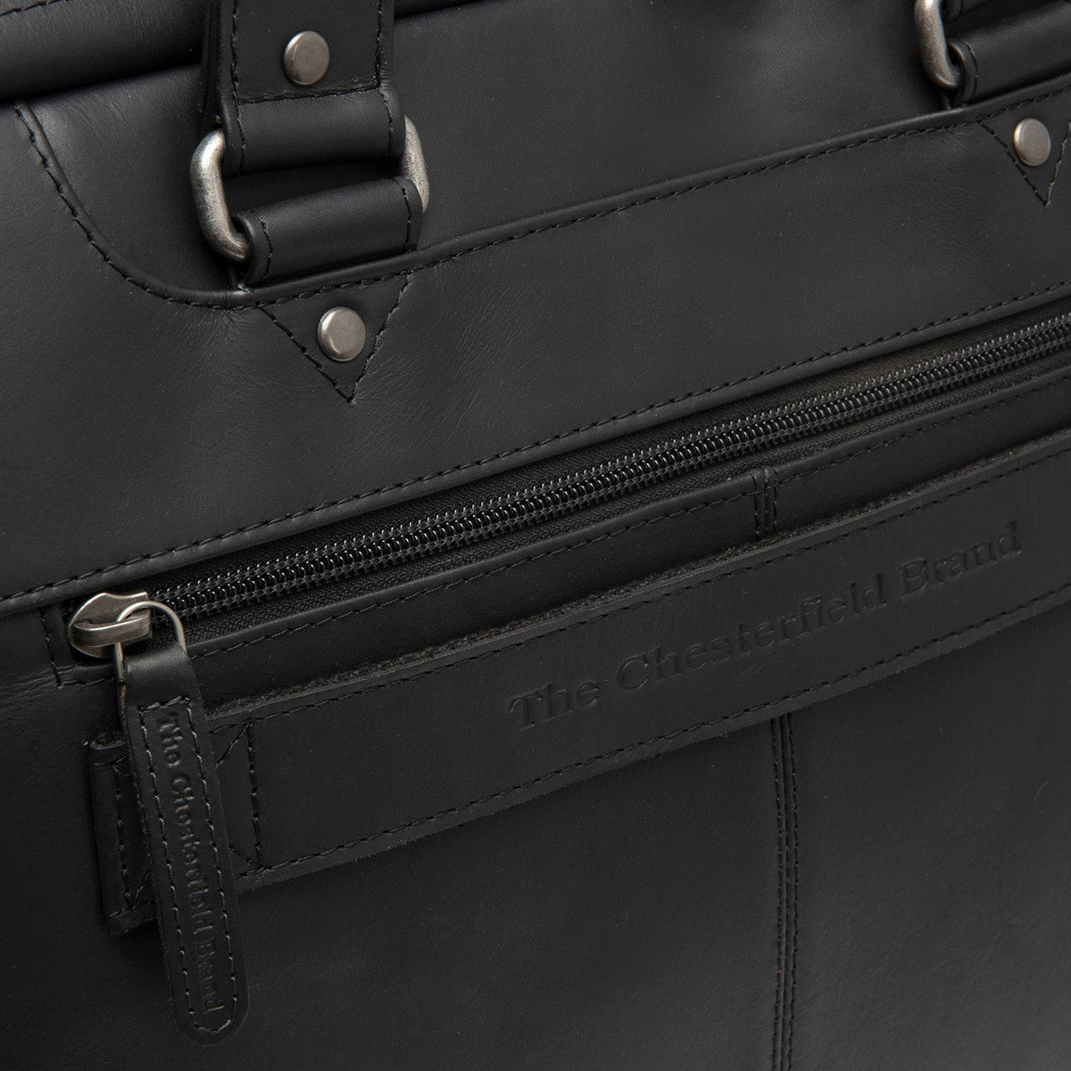 
100% Full-Grain Wax Pull-Up 100% Full-Grain Leather Grain Texture & Handcrafted Patina Detail