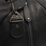 
Solid Antique Brass Hardware & Heavy-Duty Dual Zipper Detail on Rivaro Bolsa de viaje weekender de cuero flor