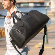 
Classic 100% Full-Grain Leather Duffle Bag - Perspectiva trasera con correas de cuero reforzadas