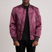 
Quinton MA-1 Granate Chaqueta Bomber de Cuero para Hombre - Vista lateral mostrando el corte ergonómico de mangas