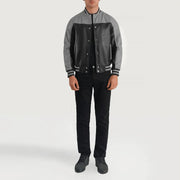 Terrance Black &amp; Red Leather Varsity Jacket - Vista de perfil lateral con corte ergonómico de manga