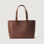 
The Bianca Vintage Distressed Brown Leather Tote Bag For Women - Perfil lateral estructurado con profundidad de fuelle