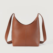 
Vista de detalle of Classic Collar & Heavy-Duty Zipper Hardware on The Stefani Brown Leather Hobo Bag For Women